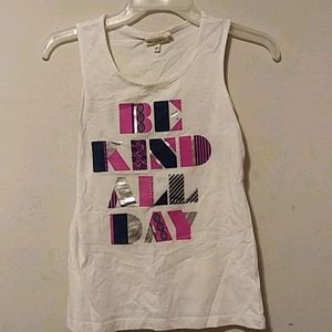 A sleeveless shirt that says Be Kind all day